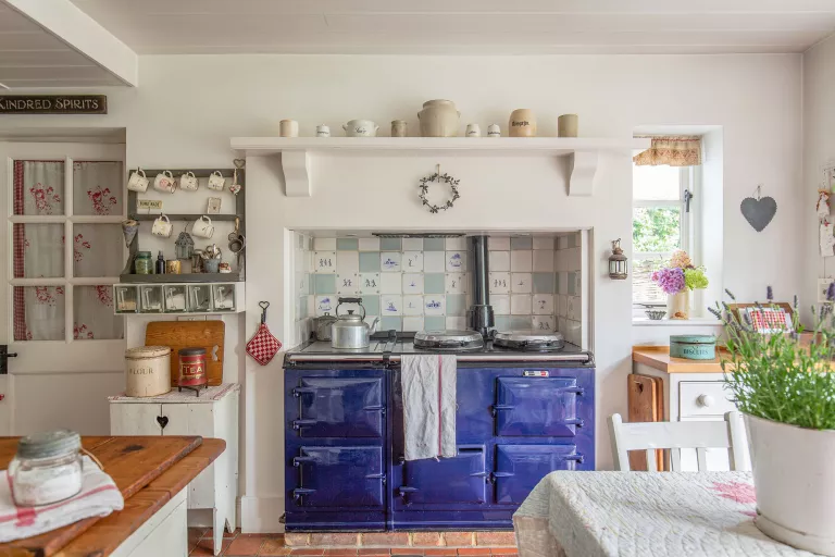 Full of handmade quilts and vintage finds, this home offers the warmest welcome